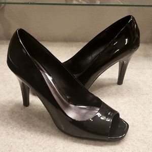 Black patent leather peep-toe heels. Size 10